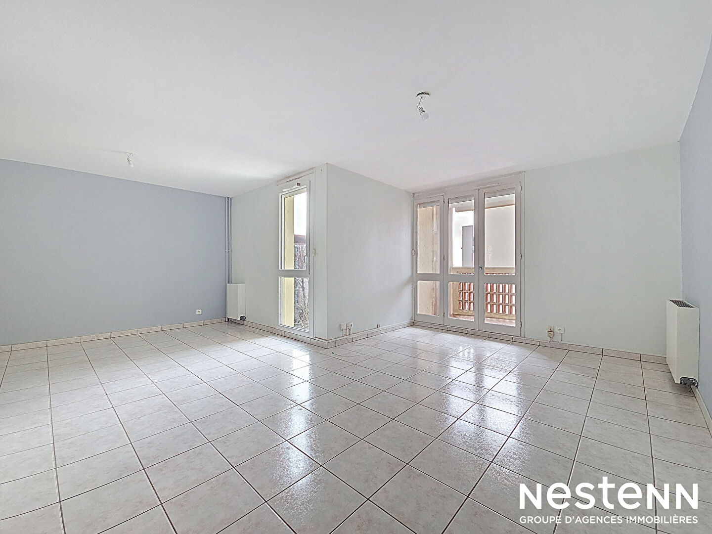 Grand appartement T3/4 de 92m² avec ascenseur, terrasse, garage et cellier à vendre au centre-ville de Castanet-Tolosan