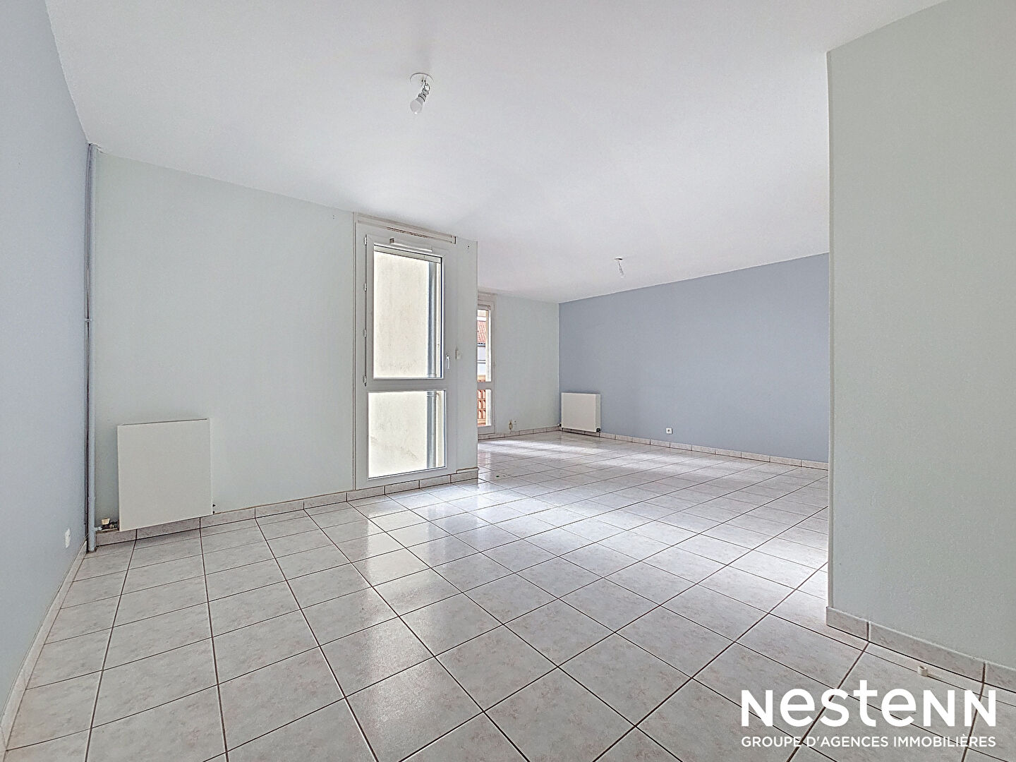 Grand appartement T3/4 de 92m² avec ascenseur, terrasse, garage et cellier à vendre au centre-ville de Castanet-Tolosan