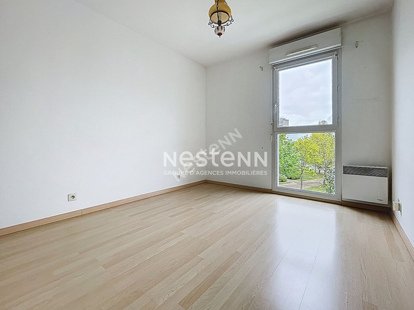 Appartement Avrillé - 2 chambres - balcon - stationnement sous-sol