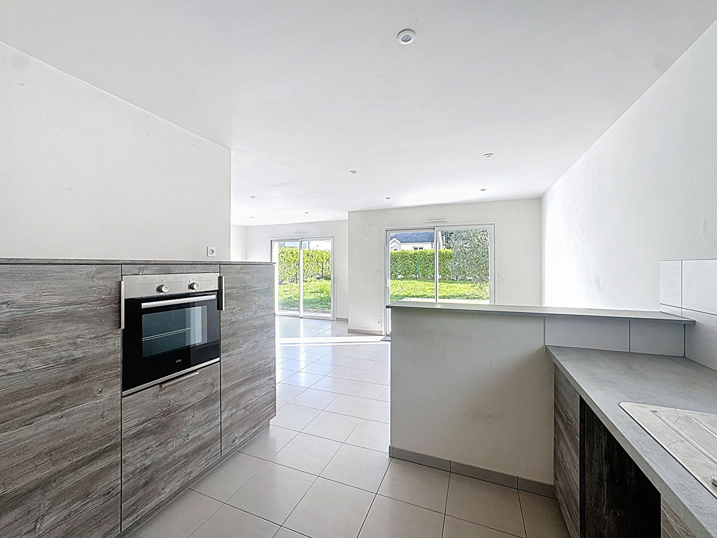 Maison avec vie de plain-pied (2015) - 4 chambres, garage, terrain clos. 92m² - Hennebont, Kerpotence.