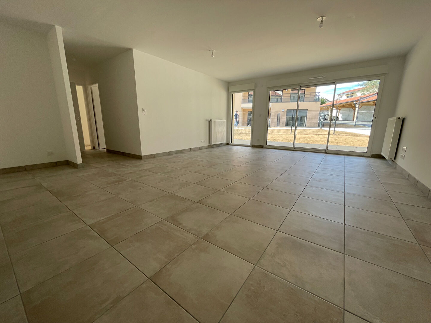 Appartement rez-de-jardin à Vaugneray 4 pièce(s), 3 ch, terrasse, jardin, 90.91 m2