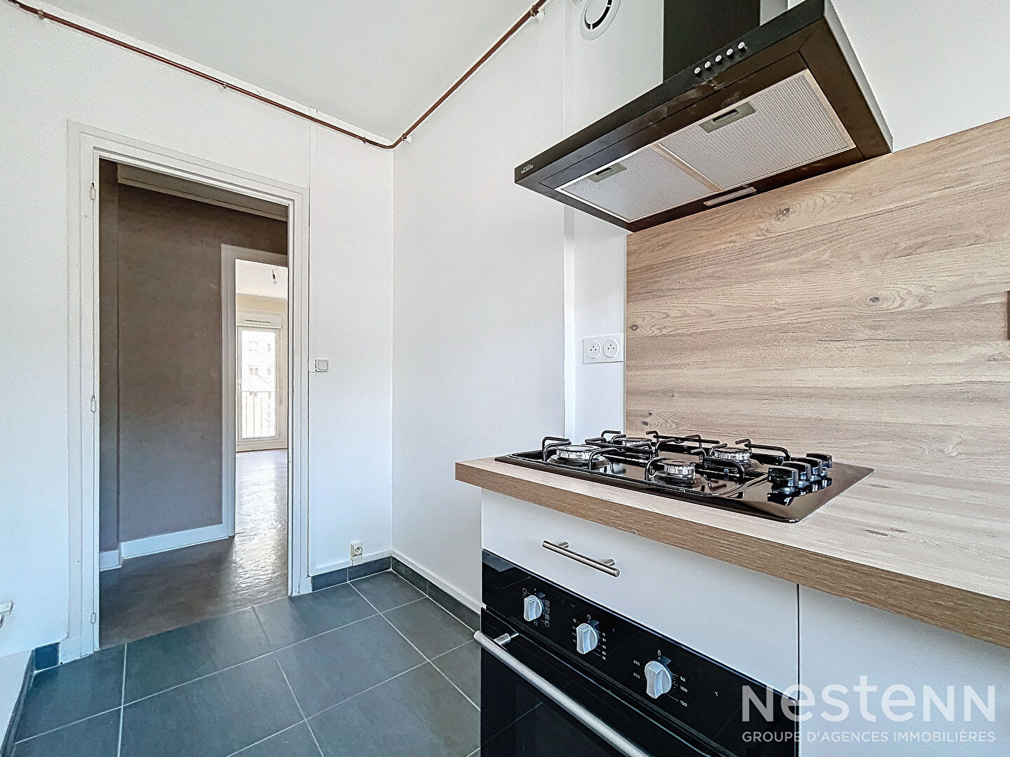 Appartement 3 pièces de 59.31 m² à Vandoeuvre-lès-Nancy avec balcon et cave.