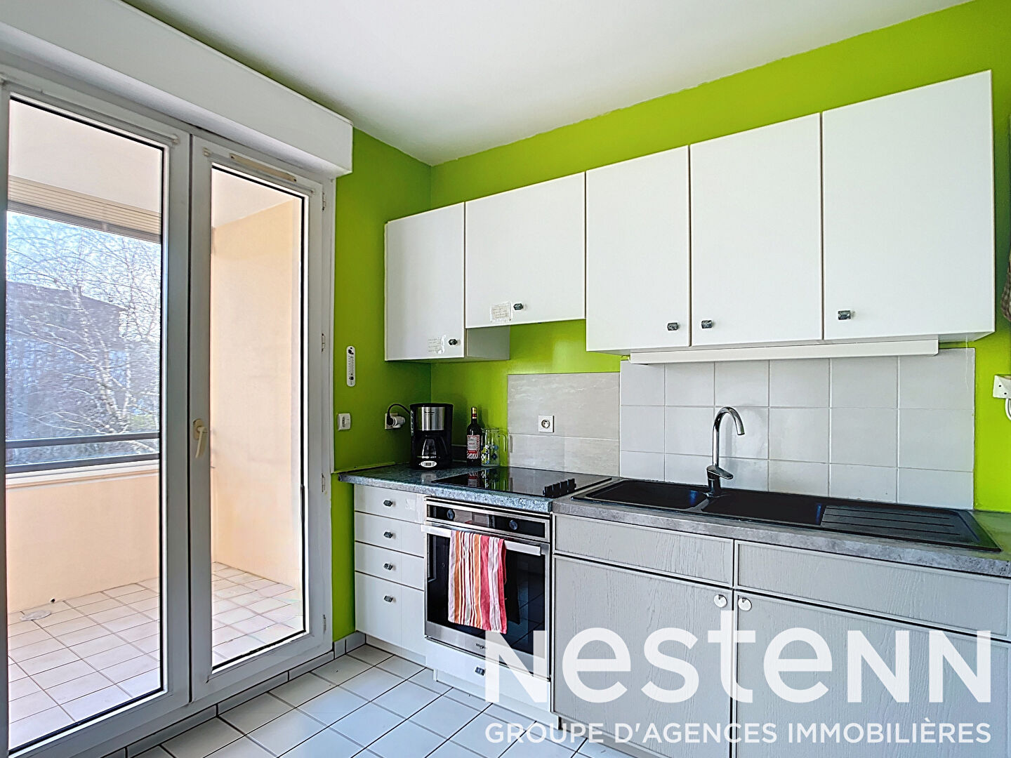 NEUVILLE SUR SAONE - APPARTEMENT T2 62 M² AU CALME VUE ARBOREE AVEC CAVE ET GARAGE PROCHE DES COMMERCES