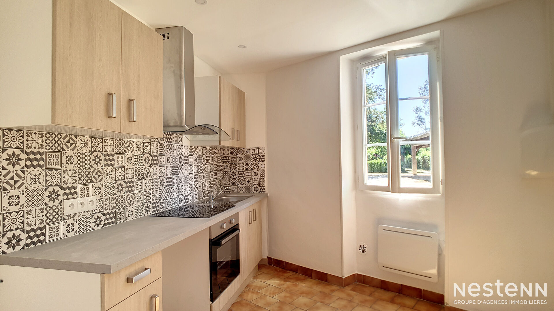 A Louer Appartement de type T3 de 65 m² avec cour commune et place de parking à Condom