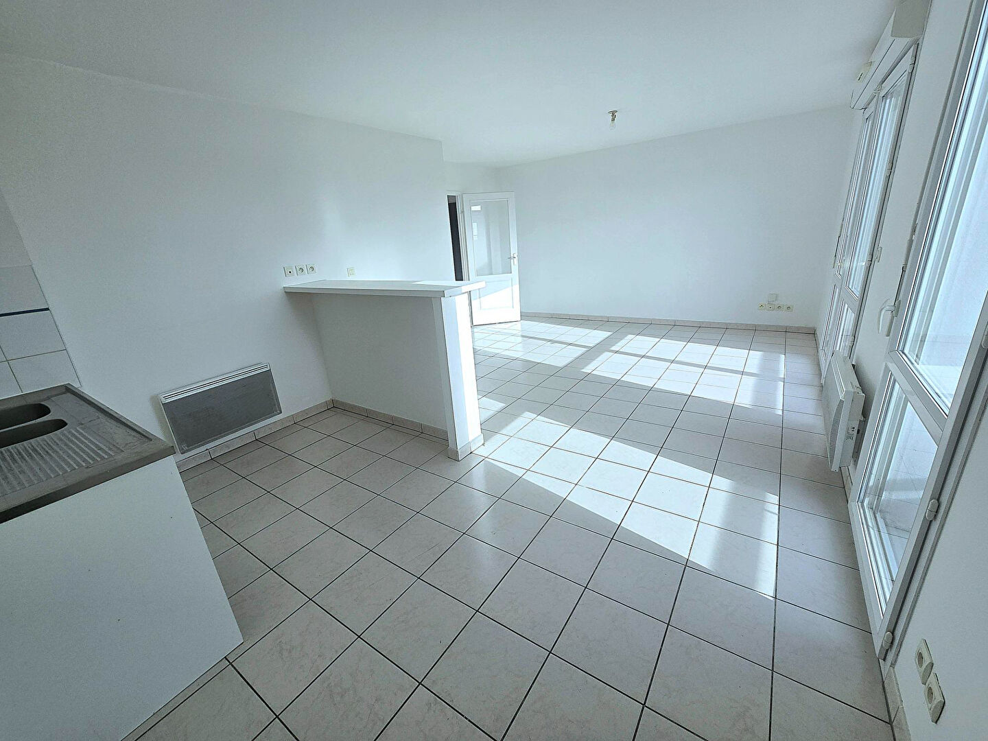 Cugnaux 31170 Agréable T3 récent de 61.76m² terrasse de 8.71m² en 2ème et dernier étage une place de parking en sous sol proche des commerces