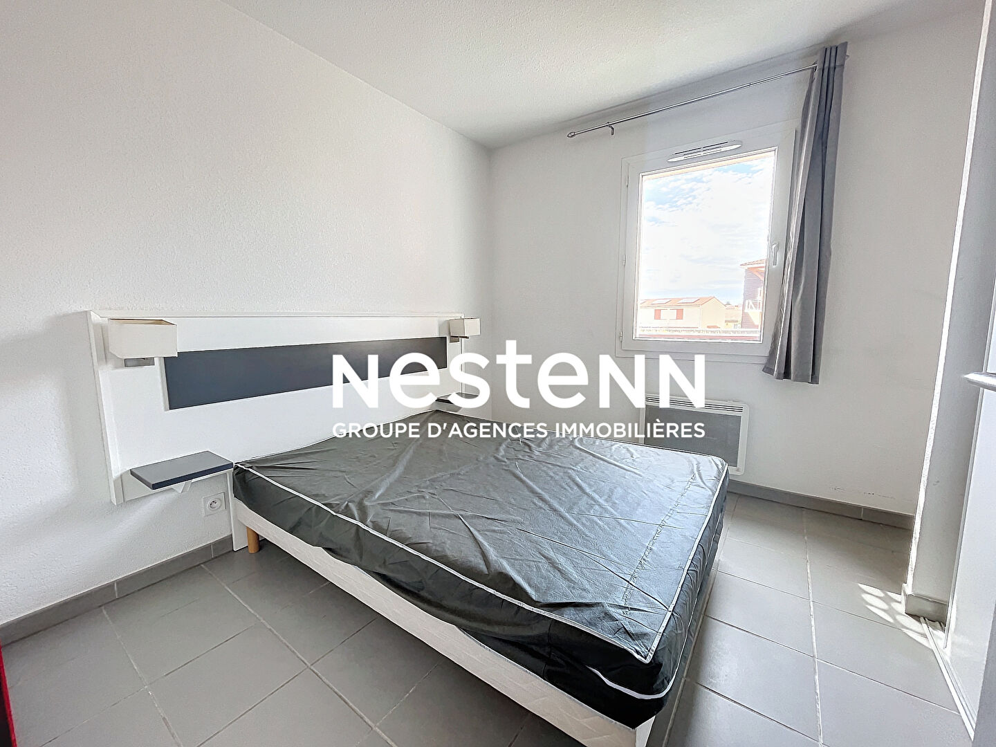 Appartement  3 pièces 46.10 m2 avec terrasse et parking privatif